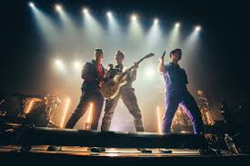 The Jonas Brothers are staging a virtual and interactive concert with fans and patrons The Jonas Brothers are staging a virtual and interactive concert with fans and patrons