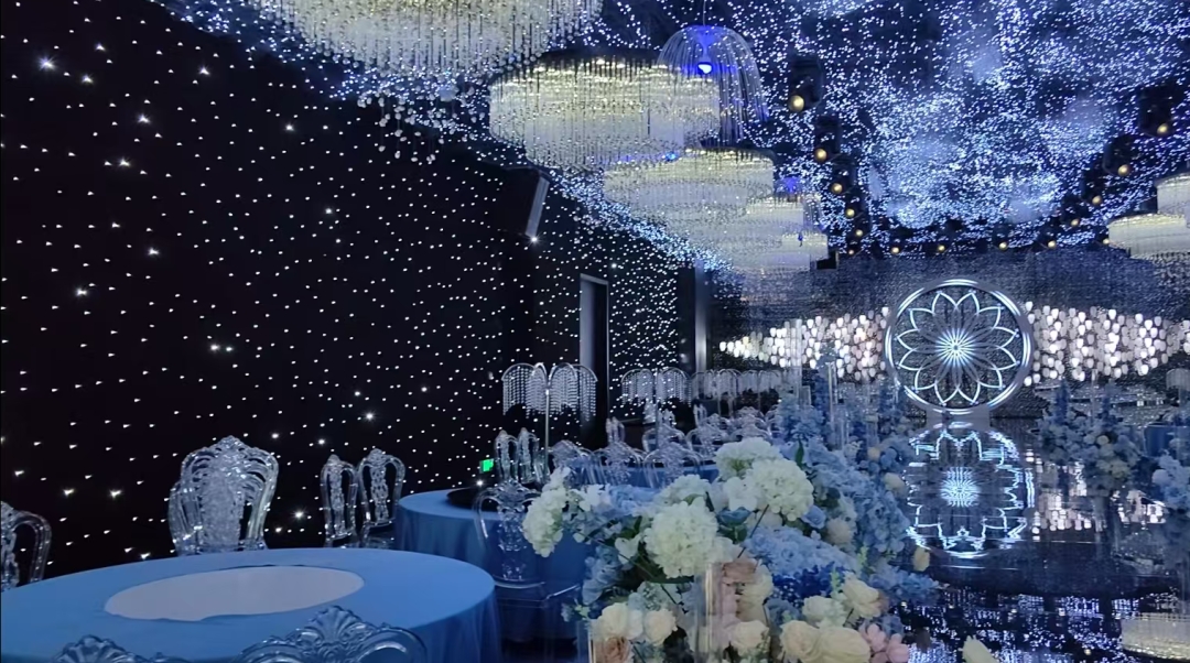 Stunning immersive space visual setup by JianFan for hotel wedding halls, utilizing DMX512 coded lighting that complements the premium guest experience delivered by the FMUSER FBE013 smart hotel TV system.
