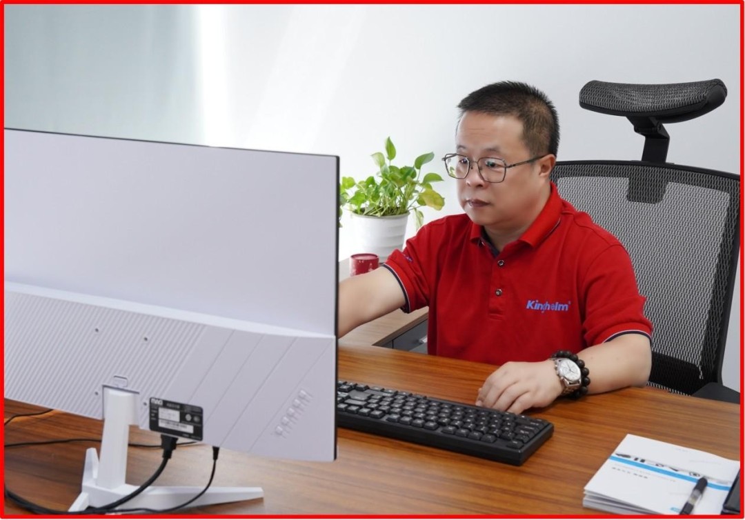 Chief Engineer Mr. Qin deeply engaged in his work