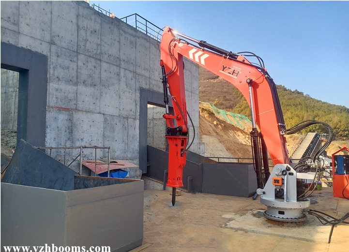 A Pedestal Boom System Can Simultaneously Break Boulders Which Blocked The Hopper Of Two Jaw Crushers