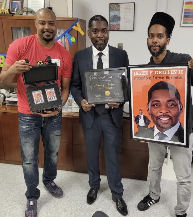 Positivity Pays honors Boyd Anderson Highschool Principal, James F. Griffin II on his birthday with his very own trading card