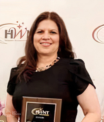 Cristina-Solis Wilson Adds a Vibrant Feather to Her Cap as She Recently Wins the Women Making History Award at the HWNT-RGV Chapter