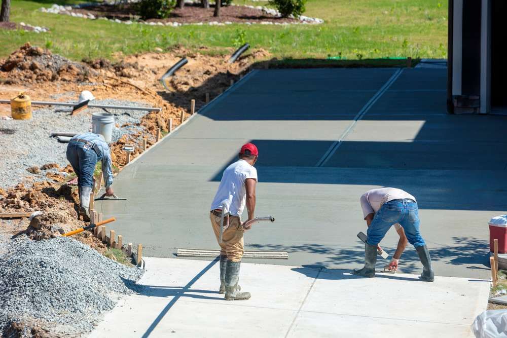 Crafting Industrial Elegance: The Art and Science Behind Concrete Garage Floors and Commercial Projects