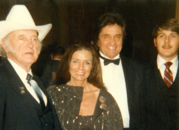 From left  are Bill Monroe, June Carter Cash, Johnny Cash and Randall Franks at the Grand Opening of the Bill Monroe Bluegrass Hall of Fame in Nashville in June 1984 in Nashville. (Randall Franks Media)
